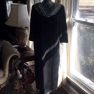 Black dress with flowing snakeskin scarf